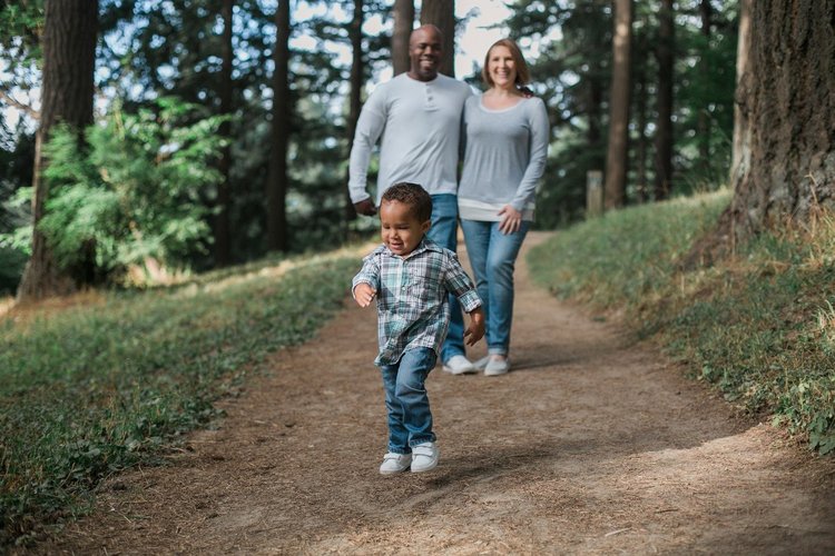 Parents with child in the forest